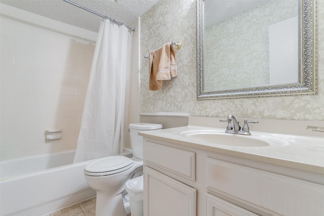 full bathroom featuring shower / bath combo, tile patterned floors, a textured ceiling, toilet, and vanity