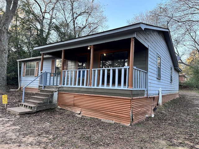 708 Ellington St, Atlanta, TX 75551 - view of front of home featuring covered porch