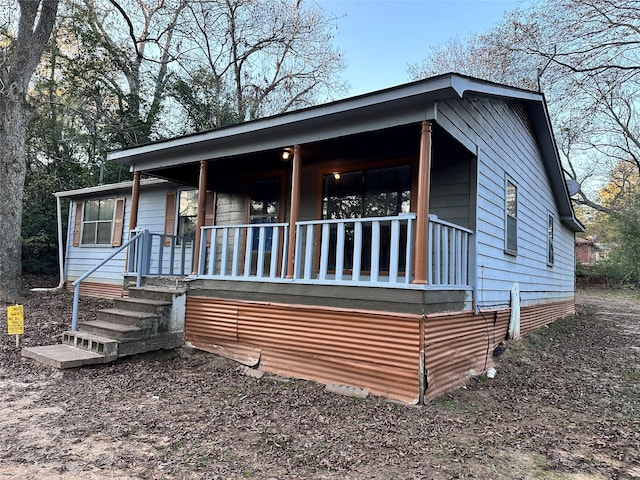 view of front of house featuring covered porch