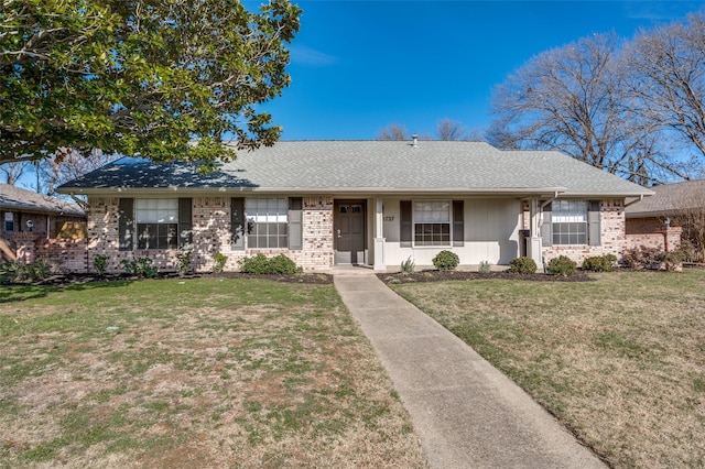 ranch-style house with a front lawn