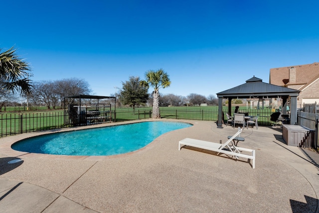 view of swimming pool featuring a gazebo and a patio