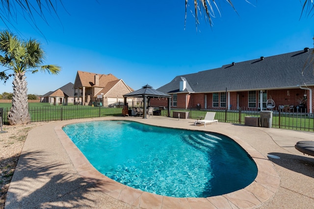 view of swimming pool featuring a gazebo, a patio area, and a lawn