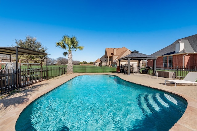 view of pool featuring a gazebo and a patio area