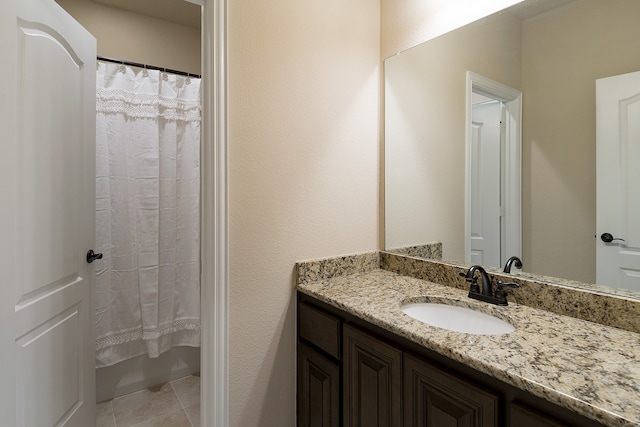 bathroom with vanity and walk in shower