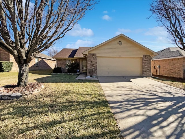 single story home with a front yard and a garage