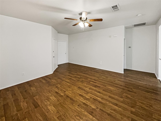 unfurnished room featuring ceiling fan and dark hardwood / wood-style flooring