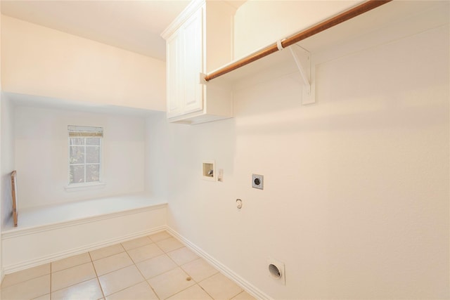 laundry area with light tile patterned flooring, cabinets, electric dryer hookup, washer hookup, and hookup for a gas dryer