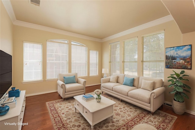 living room featuring hardwood / wood-style floors and ornamental molding