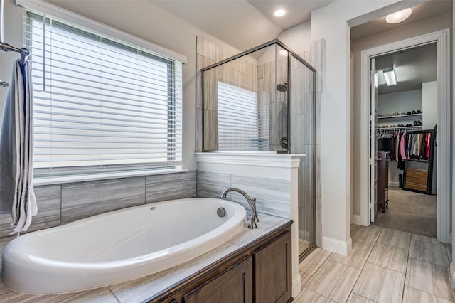 bathroom featuring plus walk in shower