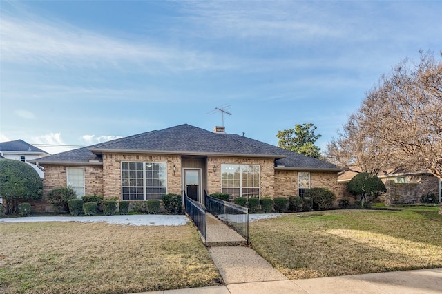 ranch-style house with a front yard