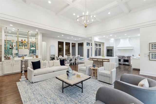 living room featuring a notable chandelier, dark hardwood / wood-style floors, beam ceiling, and coffered ceiling