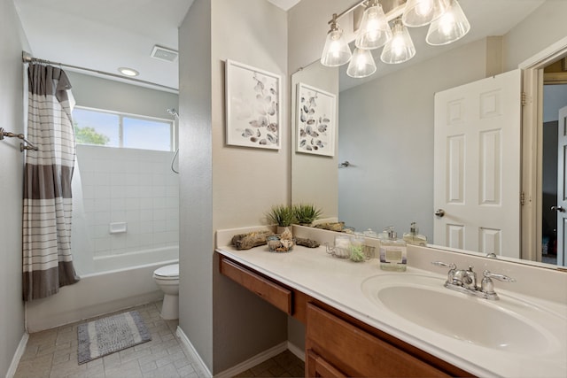 full bathroom featuring shower / tub combo, vanity, and toilet