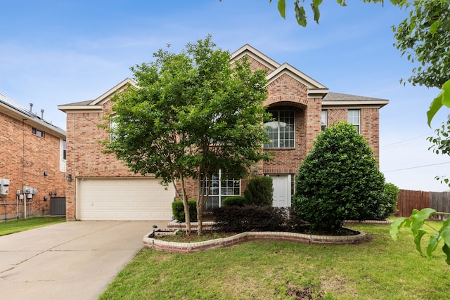 view of front of property with cooling unit, a front lawn, and a garage