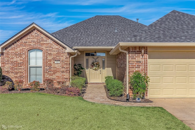 single story home with a front lawn and a garage