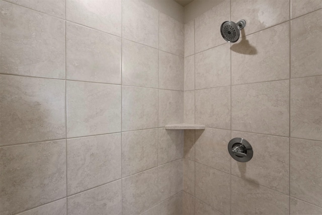 details featuring a tile shower