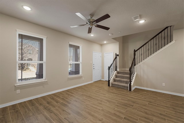 entryway with ceiling fan