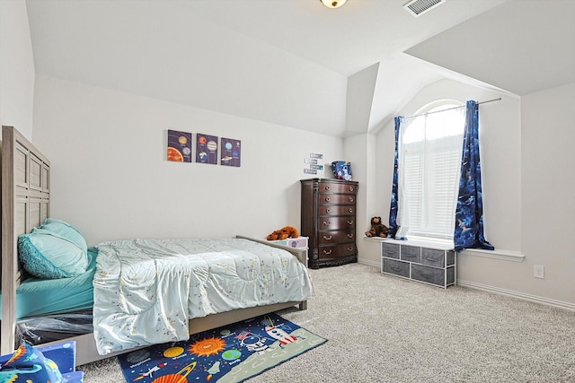 bedroom featuring carpet and lofted ceiling