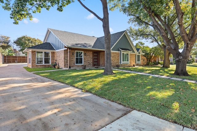 view of front of home with a front lawn