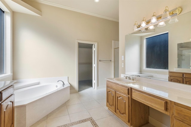 bathroom featuring vanity, a healthy amount of sunlight, tile patterned floors, and ornamental molding