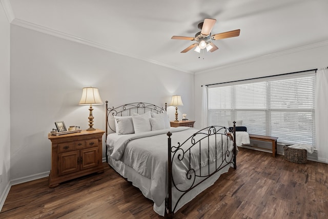 bedroom featuring ceiling fan, dark hardwood / wood-style flooring, and crown molding