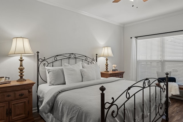 bedroom featuring ceiling fan, dark hardwood / wood-style floors, and ornamental molding