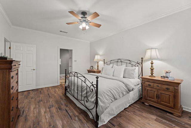 bedroom with dark hardwood / wood-style flooring, ceiling fan, and ornamental molding