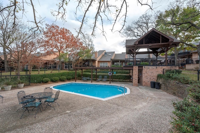 view of pool with a gazebo and a patio