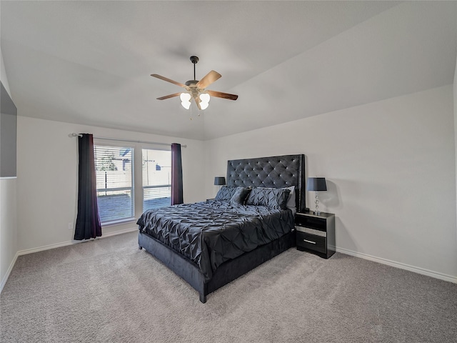 bedroom featuring light carpet, ceiling fan, and lofted ceiling