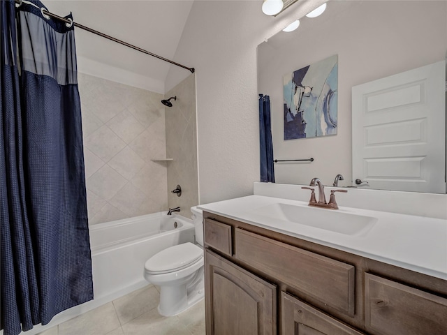 full bathroom featuring tile patterned floors, vanity, toilet, and shower / bath combo with shower curtain