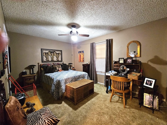 bedroom with ceiling fan, light carpet, and a textured ceiling