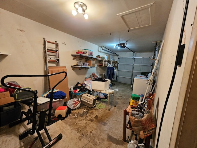 garage featuring washer / clothes dryer and a garage door opener