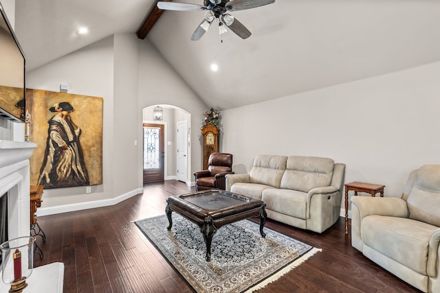 living room with high vaulted ceiling, dark hardwood / wood-style floors, beam ceiling, and ceiling fan