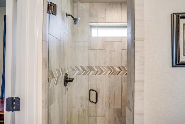 bathroom featuring walk in shower