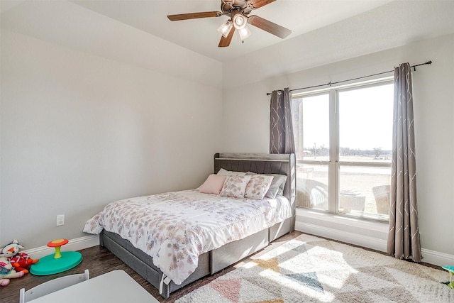 bedroom featuring vaulted ceiling and ceiling fan