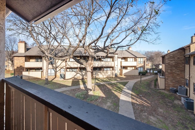 exterior space featuring a balcony and cooling unit