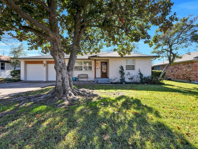 single story home featuring a front yard and a garage