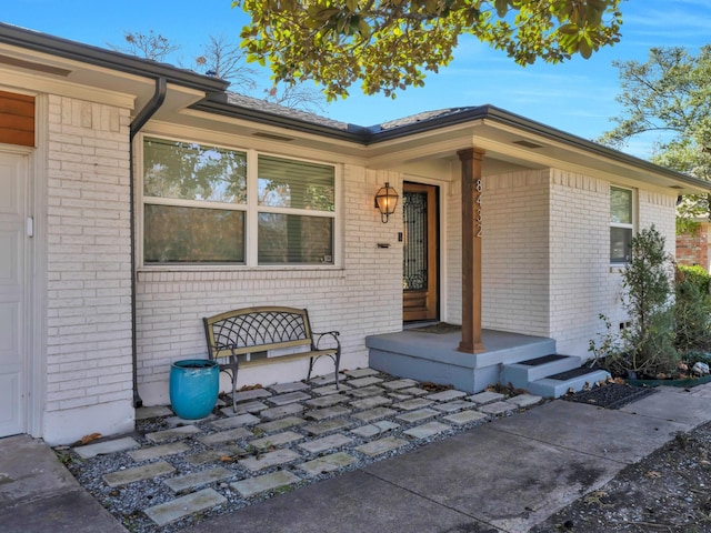 entrance to property with a patio