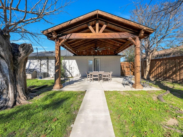 view of patio / terrace with a gazebo and ceiling fan