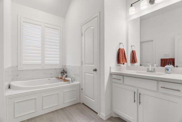 bathroom featuring vanity and a bathtub