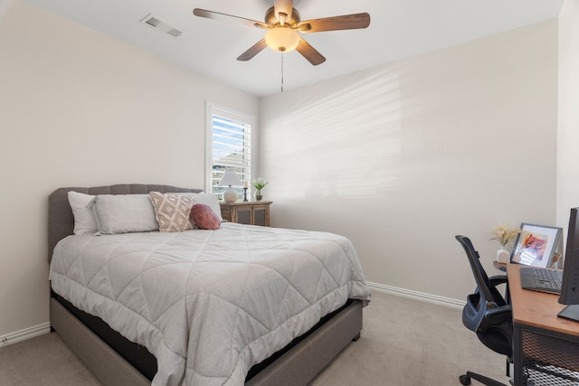 bedroom with light colored carpet and ceiling fan