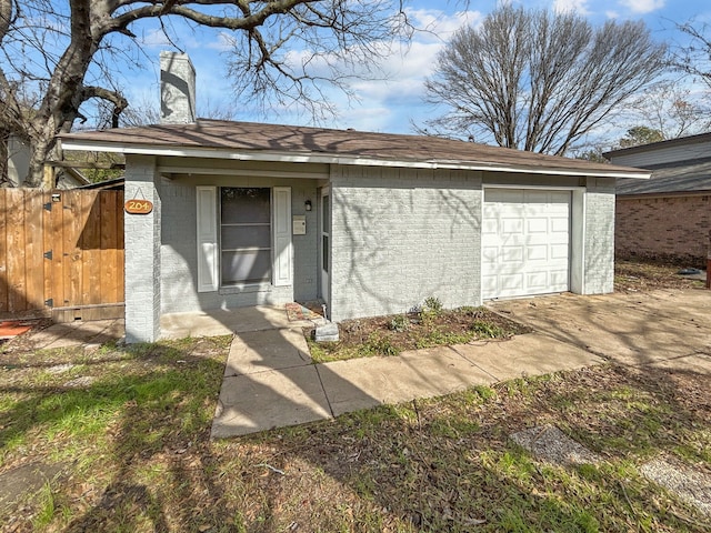 entrance to property featuring a garage