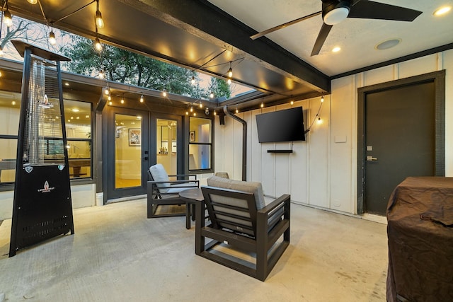 exterior space with ceiling fan and an outdoor hangout area