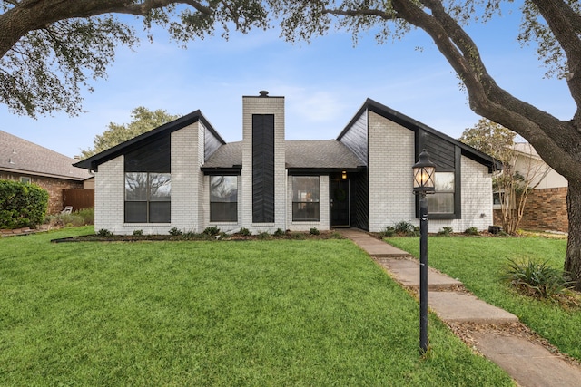 view of front of house with a front yard