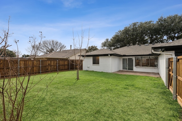 view of yard with a patio area