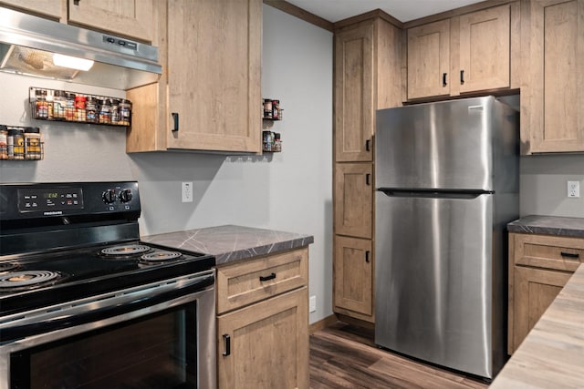 kitchen with stainless steel fridge, light brown cabinetry, dark wood-type flooring, and electric stove