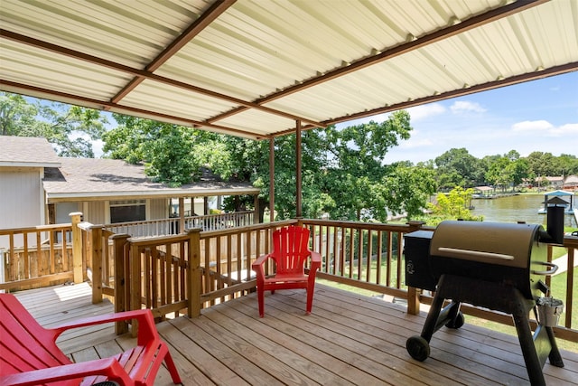 wooden deck featuring a water view