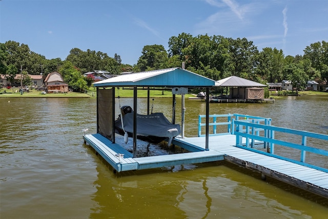 dock area featuring a water view