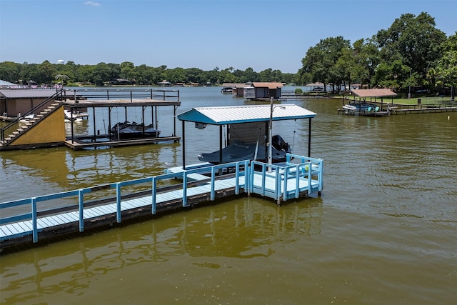 view of dock with a water view