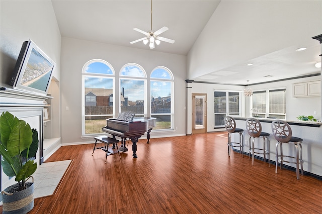 6413 Greenbriar Ln, Fort Worth, TX 76132 - sitting room with ceiling fan, high vaulted ceiling, baseboards, and wood finished floors