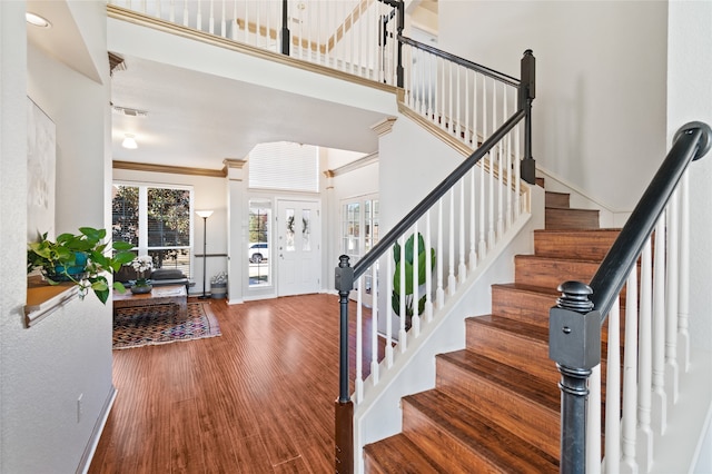 6413 Greenbriar Ln, Fort Worth, TX 76132 - foyer with wood finished floors, stairway, baseboards, and ornamental molding